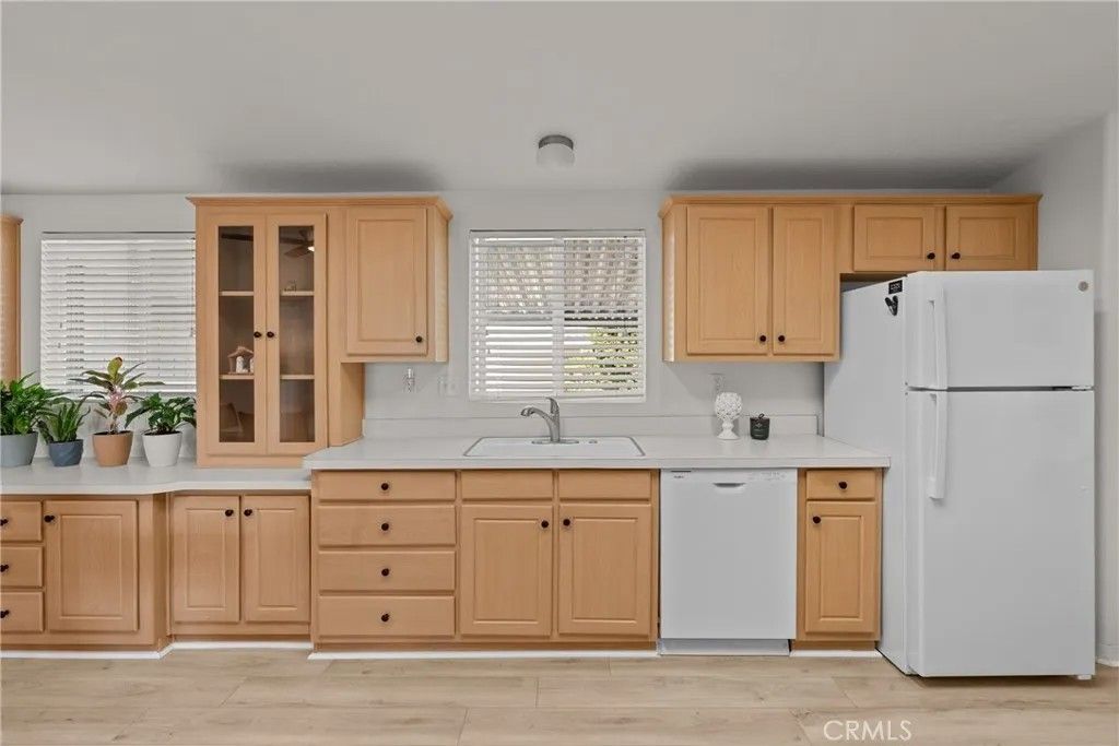 Photo of 24001 Muirlands Blvd #12, Lake Forest, CA 92630 (MLS # OC26045196)