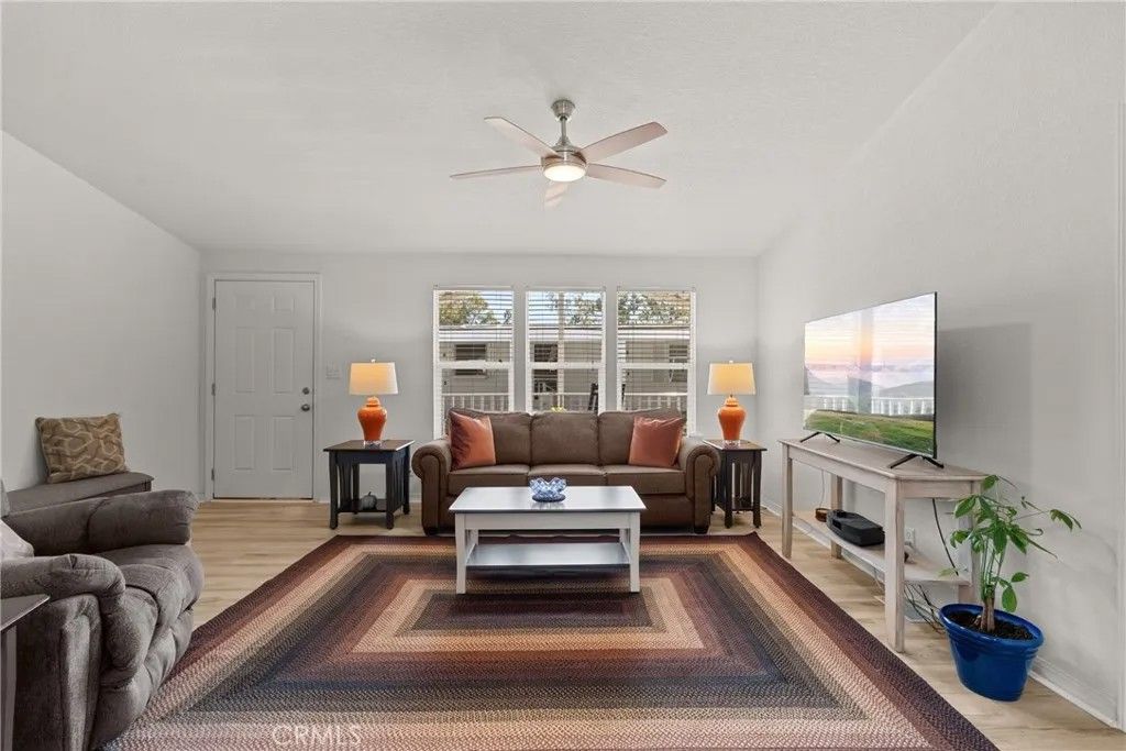 Photo of 24001 Muirlands Blvd #12, Lake Forest, CA 92630 (MLS # OC26045196)