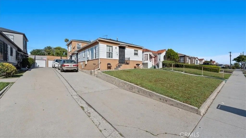 Photo of 7831 S Normandie Ave, Los Angeles, CA 90044 (MLS # CV26083183)