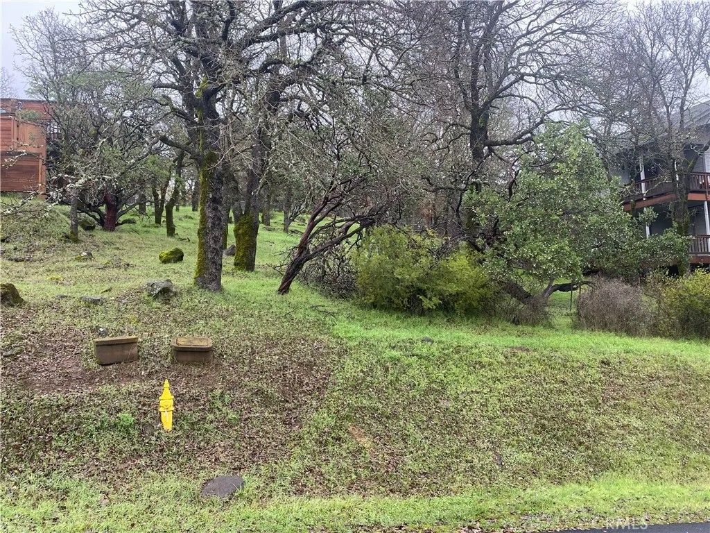 Photo of 19210 N Shore Ct, Hidden Valley Lake, CA 95467 (MLS # LC25280159)