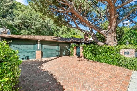 Photo of 1821 Mandeville Canyon, Los Angeles, CA 90049 (MLS # PW26083394)