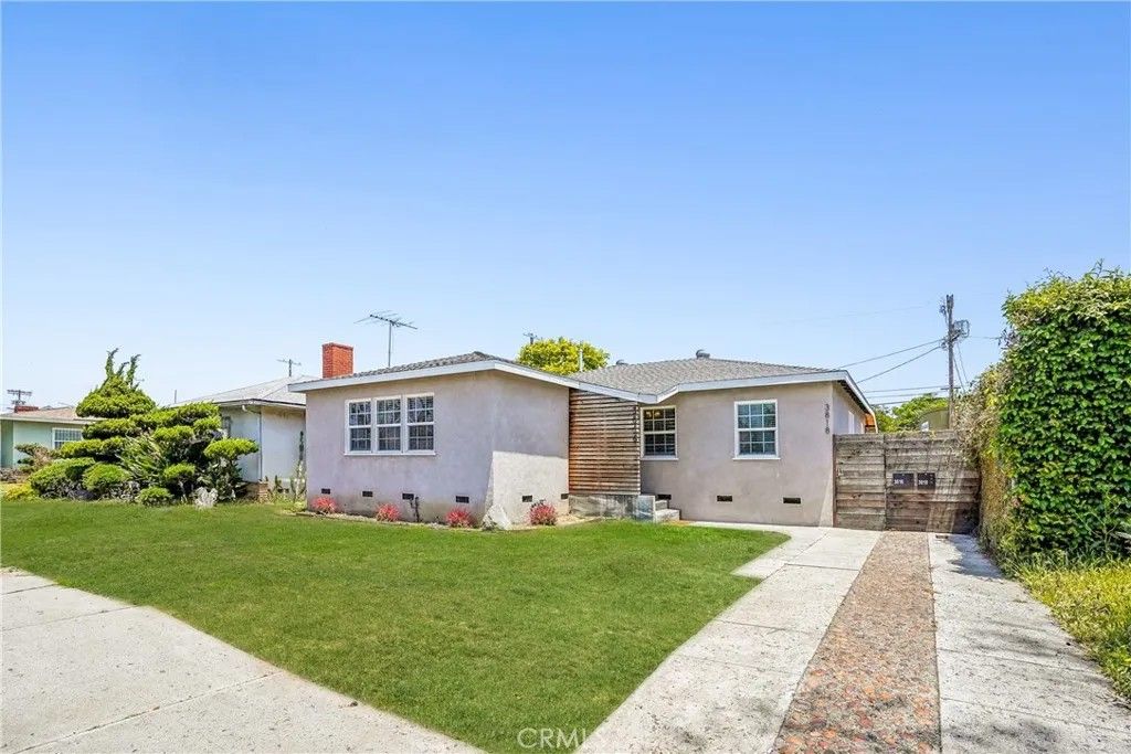 Photo of 3816 S Victoria Avenue, Los Angeles, CA 90008 (MLS # DW26086789)