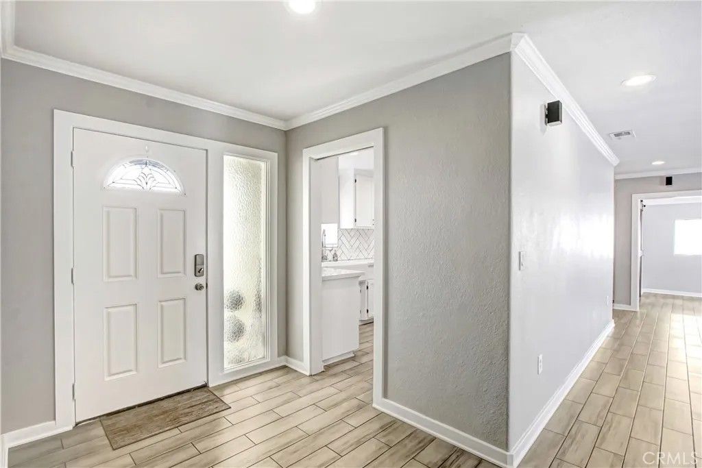 Photo of 35597 Velardo Dr, Yucaipa, CA 92399 (MLS # IV26037840)