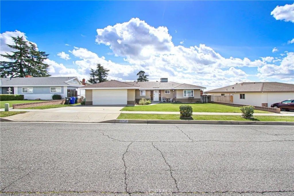 Photo of 35597 Velardo Dr, Yucaipa, CA 92399 (MLS # IV26037840)