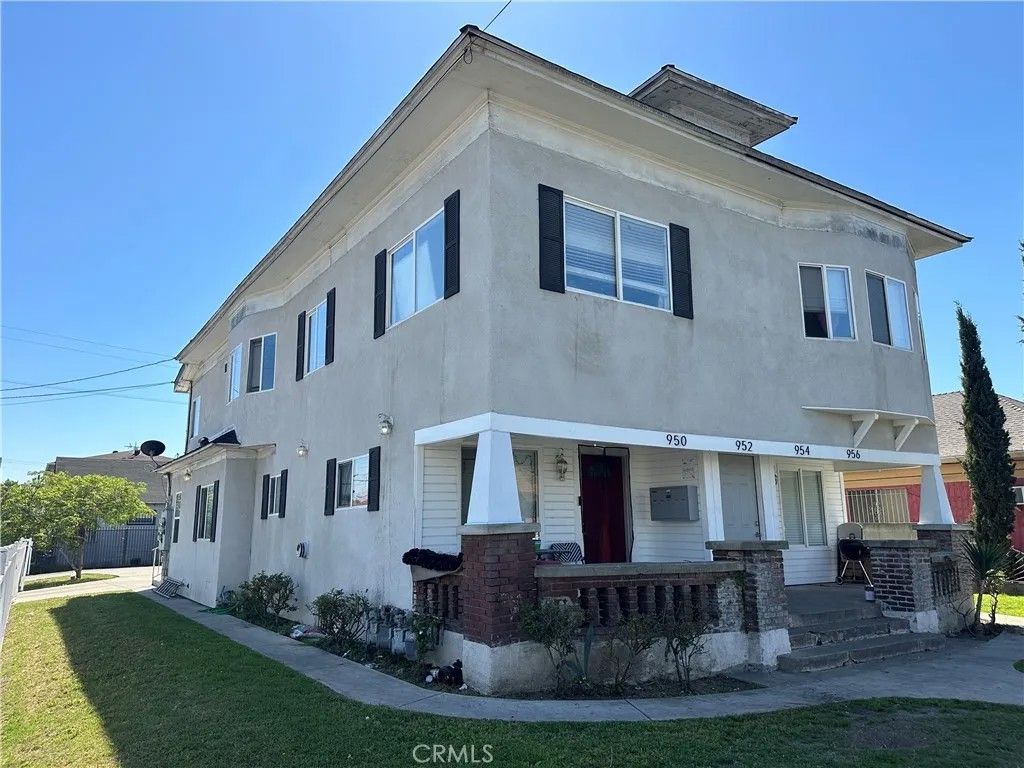 Photo of 956 E 43rd, Los Angeles, CA 90011 (MLS # DW26066226)