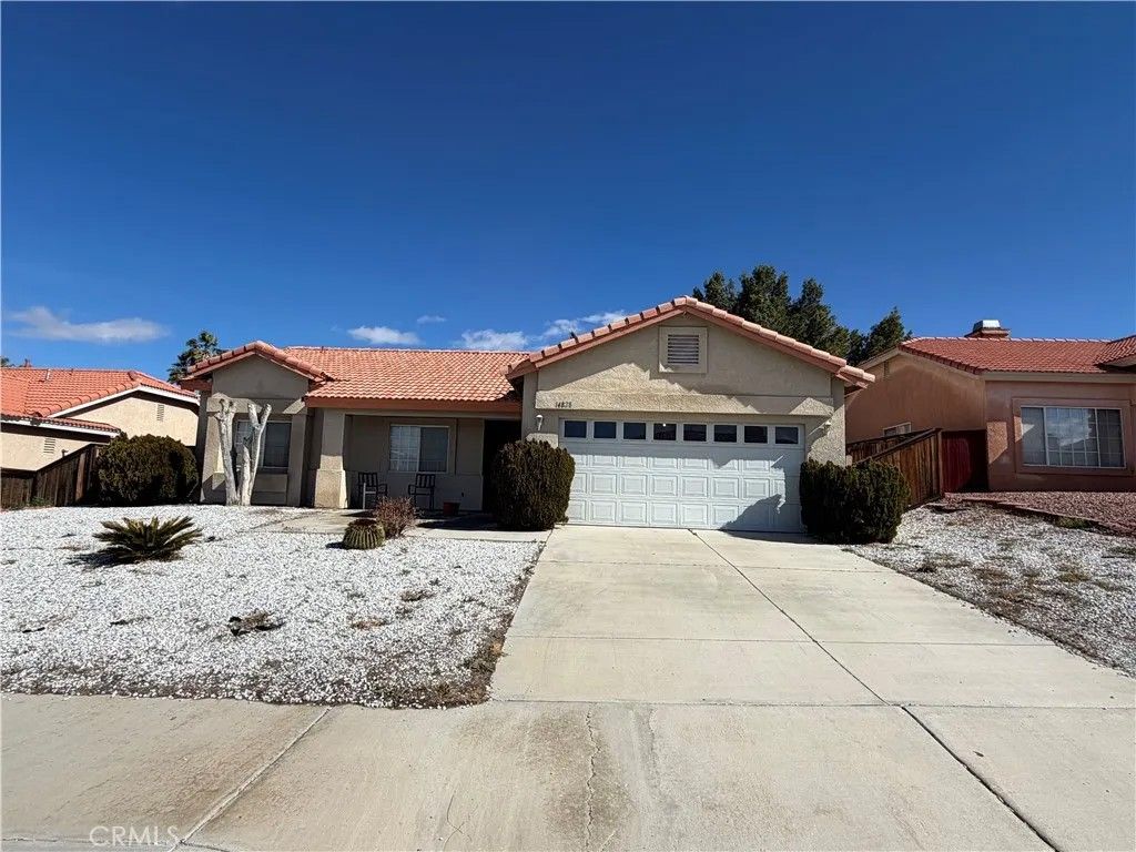 Photo of 14828 Stone Age Lane, Victorville, CA 92394 (MLS # IG26048187)