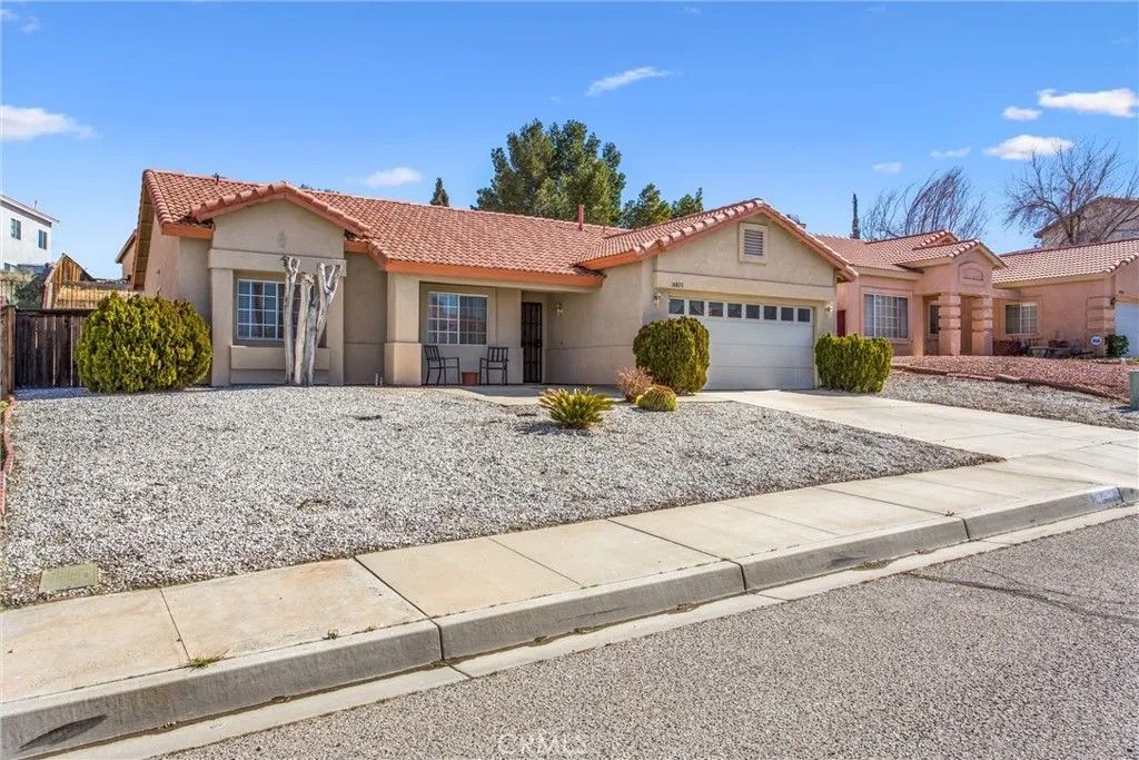 Photo of 14828 Stone Age Lane, Victorville, CA 92394 (MLS # IG26048187)