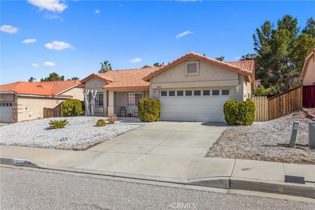 Photo of 14828 Stone Age Lane, Victorville, CA 92394 (MLS # IG26048187)