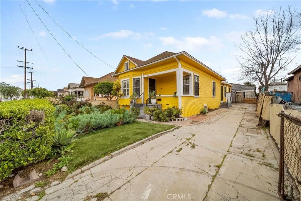 Photo of 1220 E 40th Place, Los Angeles, CA 90011 (MLS # SB26036667)