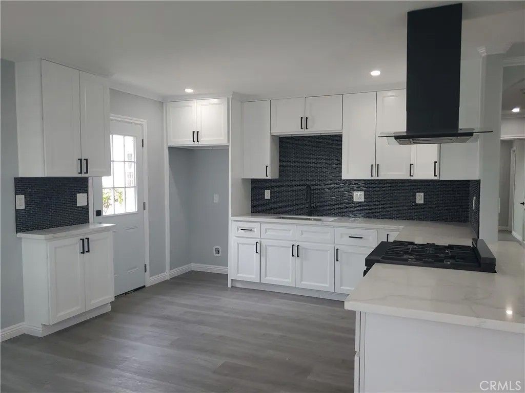 Photo of 1133 W 58th St, Los Angeles, CA 90037 (MLS # DW26085115)