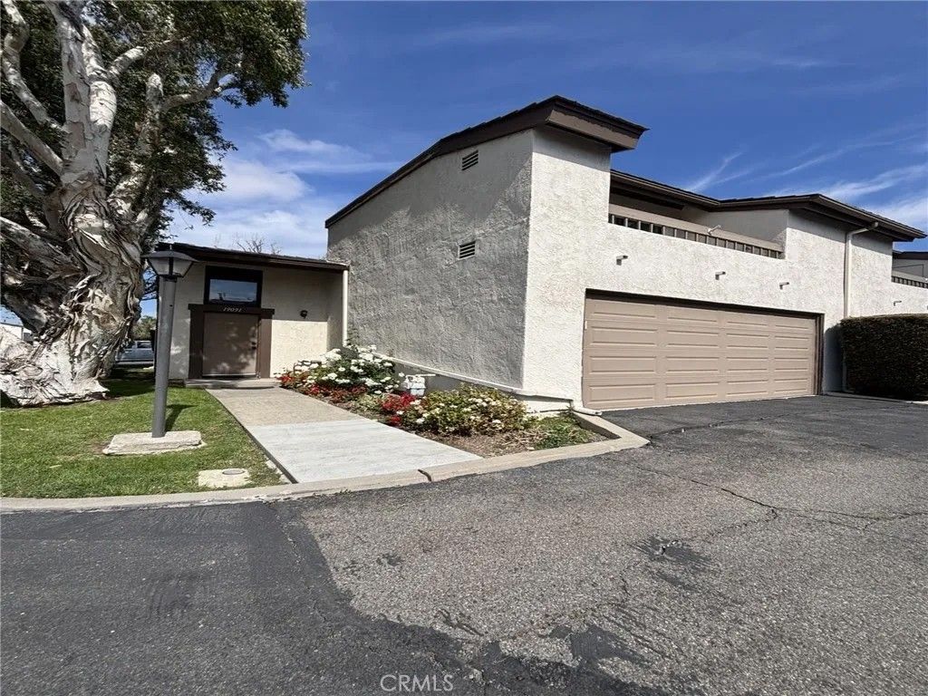 Photo of 19091 E Country Hollow # 34 Holw, Orange, CA 92869 (MLS # IG26048041)