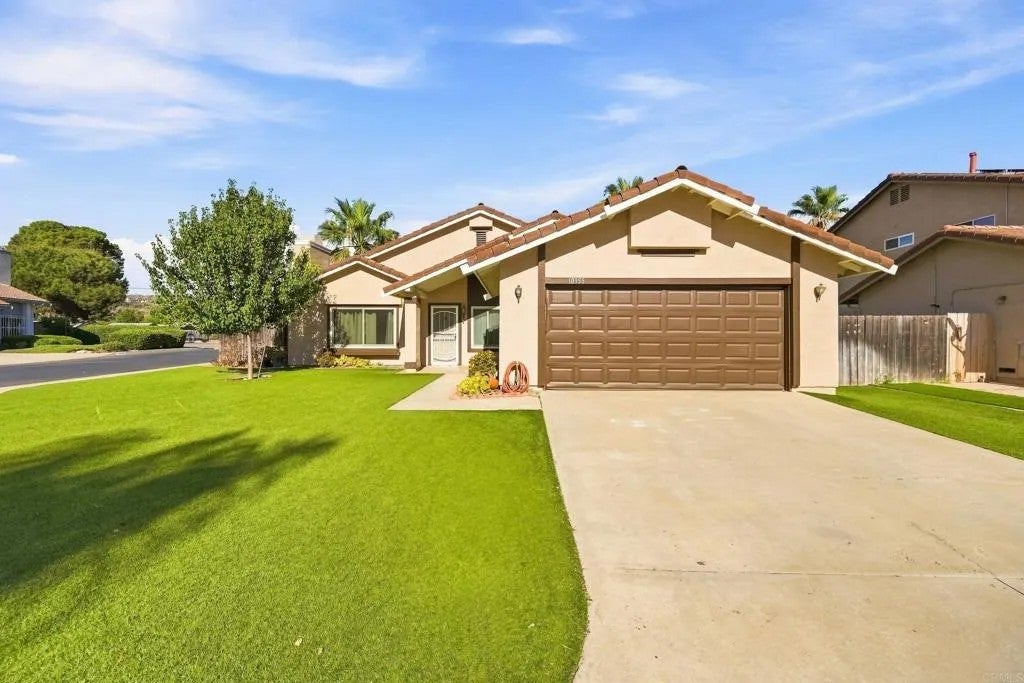 Photo of 10355 Paseo Palmas Dr, Lakeside, CA 92040 (MLS # PTP2606353)
