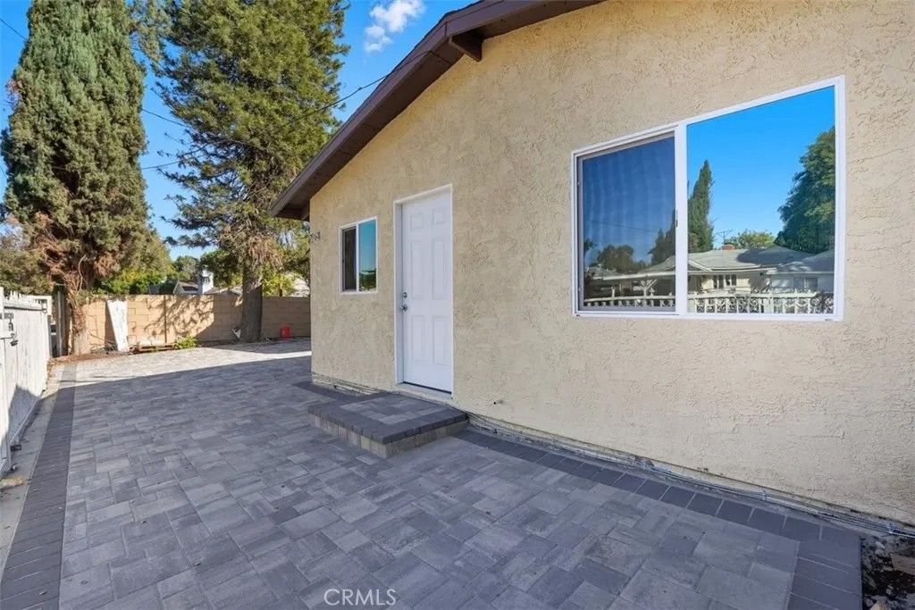 Photo of 7960 Tampa, Reseda, CA 91335 (MLS # SR26020016)