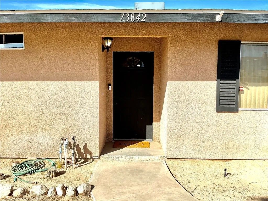 Photo of 73842 White Sands Dr, 29 Palms, CA 92277 (MLS # JT26053830)