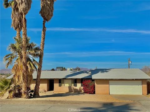 Photo of 73842 White Sands Dr, 29 Palms, CA 92277 (MLS # JT26053830)