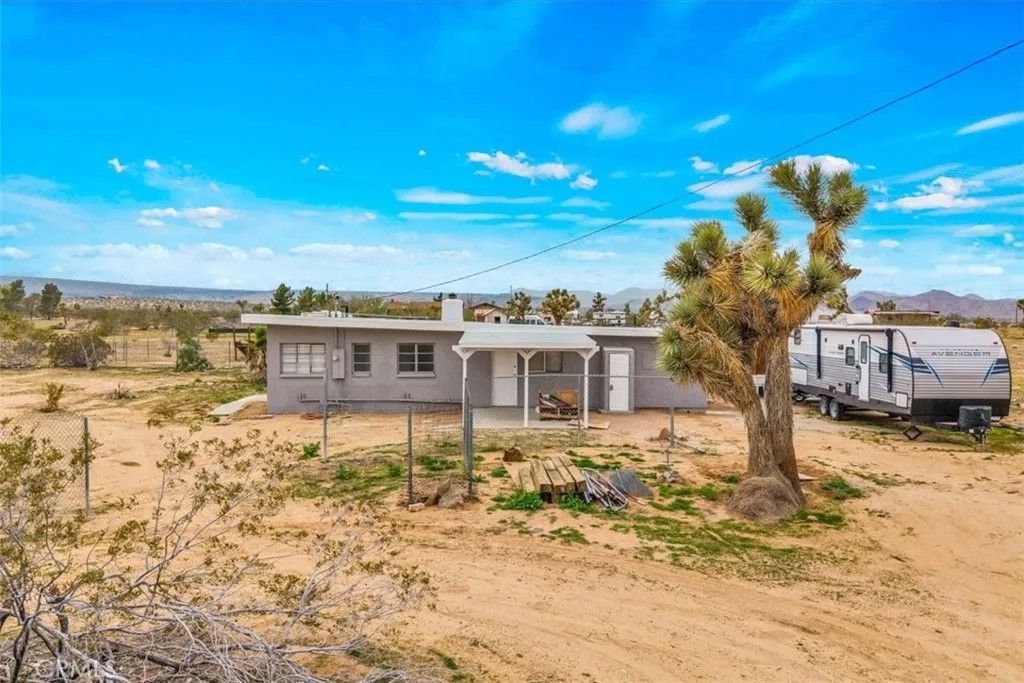 Photo of 57726 Starlight Mesa Road, Yucca Valley, CA 92284 (MLS # JT25277237)