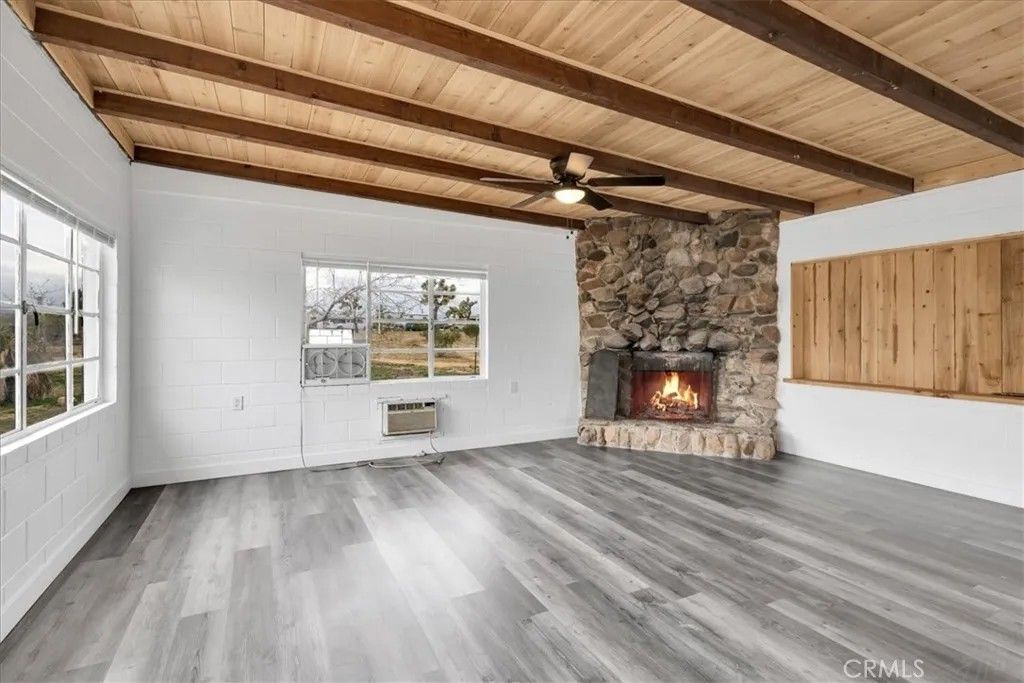 Photo of 57726 Starlight Mesa Road, Yucca Valley, CA 92284 (MLS # JT25277237)