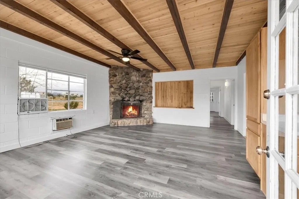 Photo of 57726 Starlight Mesa Road, Yucca Valley, CA 92284 (MLS # JT25277237)