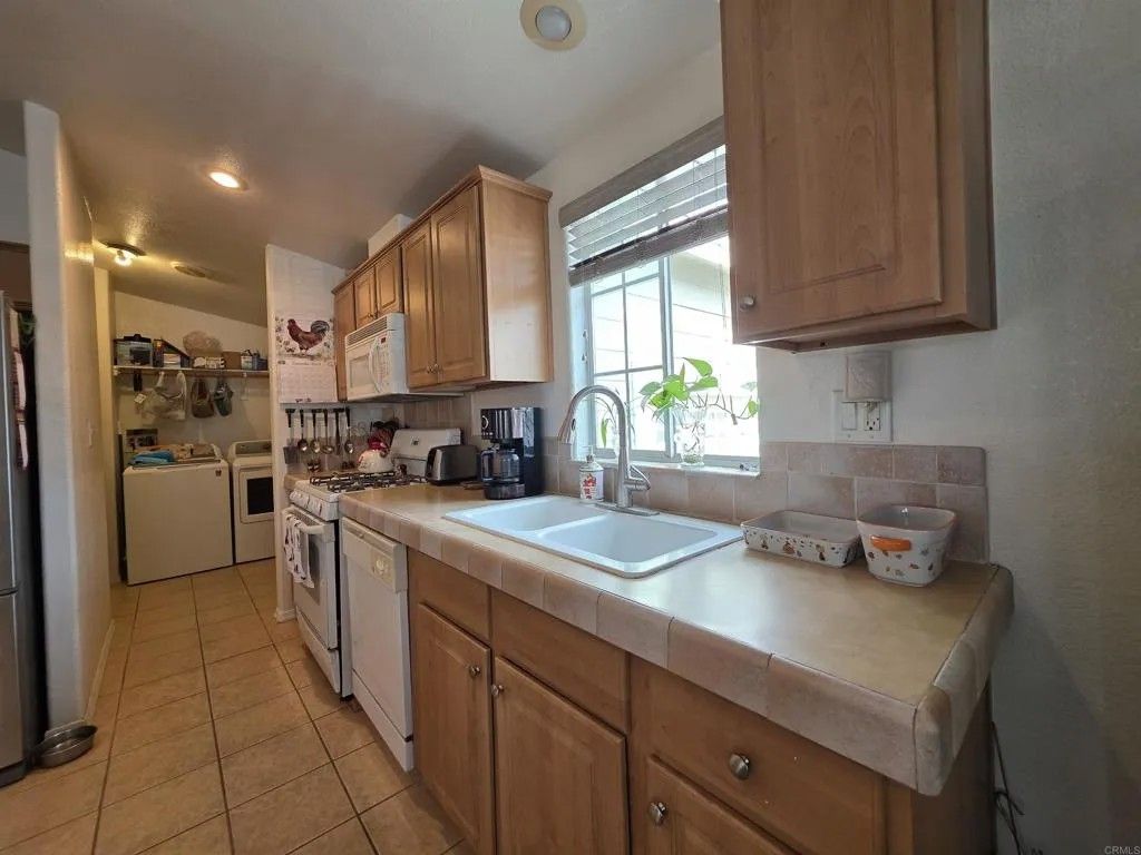 Photo of 450 E Bradley Ave #144, El Cajon, CA 92021 (MLS # PTP2600195)