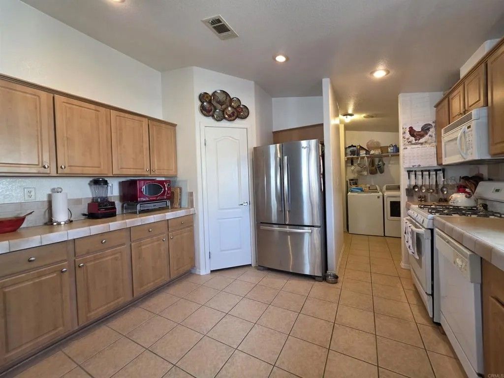 Photo of 450 E Bradley Ave #144, El Cajon, CA 92021 (MLS # PTP2600195)