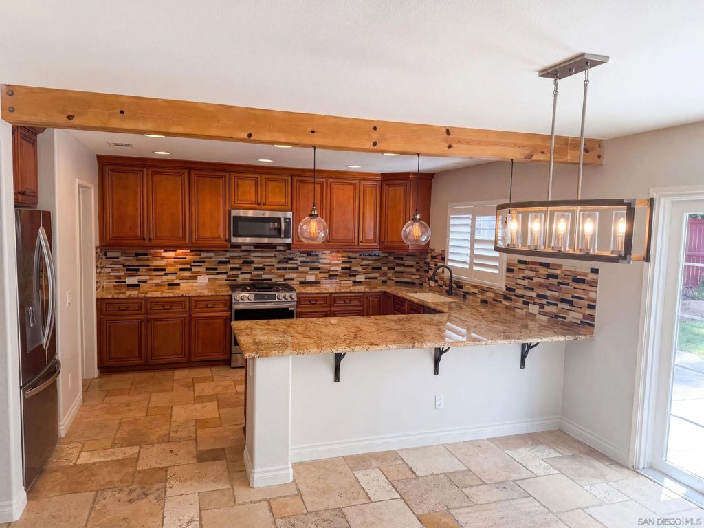 Photo of 5105 Mendip ST, Oceanside, CA 92057 (MLS # 260020201)