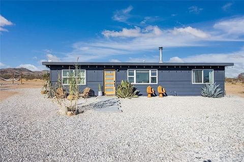 Photo of 1856 Cambria Ave, Landers, CA 92285 (MLS # JT25245894)