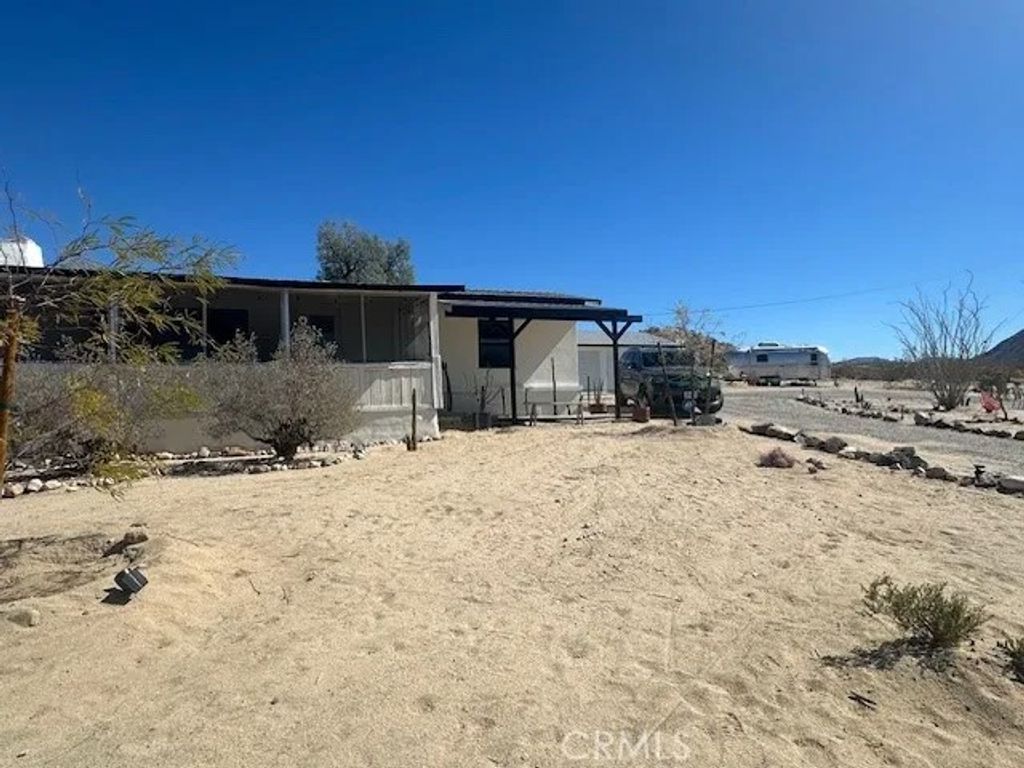 Photo of 6597 Mesquite Springs, 29 Palms, CA 92277 (MLS # OC25279448)