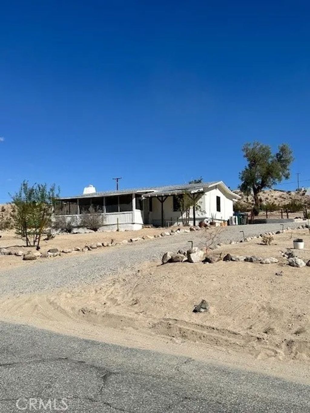 Photo of 6597 Mesquite Springs, 29 Palms, CA 92277 (MLS # OC25279448)