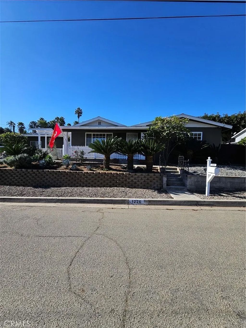 Photo of 1226 Calvin Ln, Escondido, CA 92025 (MLS # SW25278157)