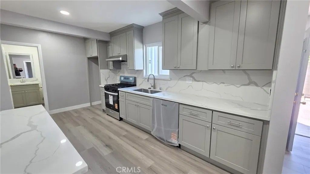 Photo of 1186 W 9th St, Pomona, CA 91766 (MLS # TR25273015)