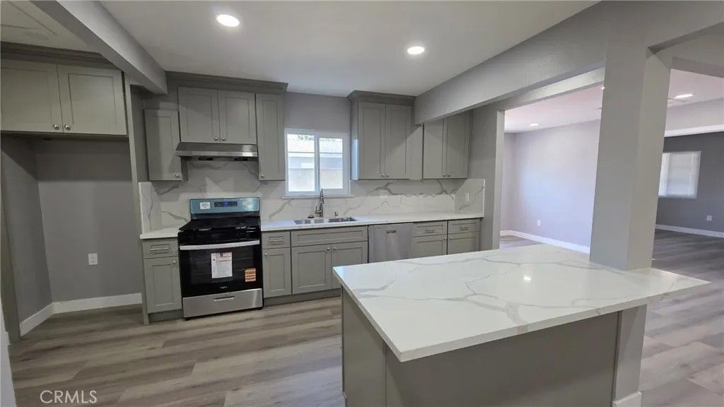 Photo of 1186 W 9th St, Pomona, CA 91766 (MLS # TR25273015)