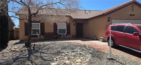 Photo of 11009 Pemberton Way, Adelanto, CA 92301 (MLS # IV26051591)