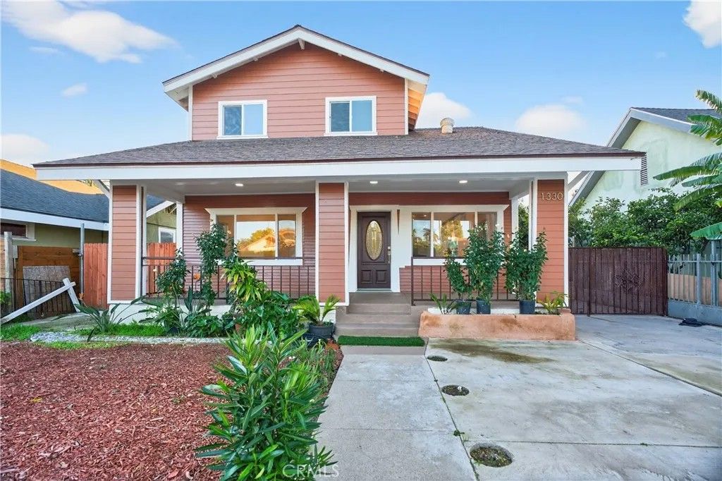 Photo of 1330 W 48th St, Los Angeles, CA 90037 (MLS # DW26005375)