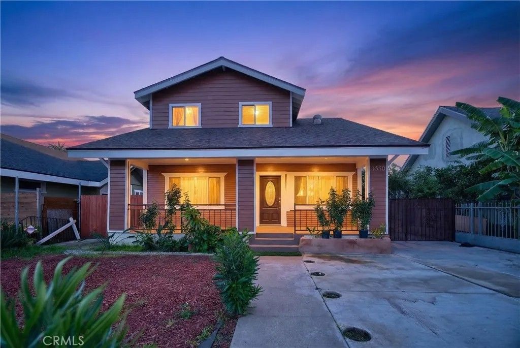 Photo of 1330 W 48th St, Los Angeles, CA 90037 (MLS # DW26005375)