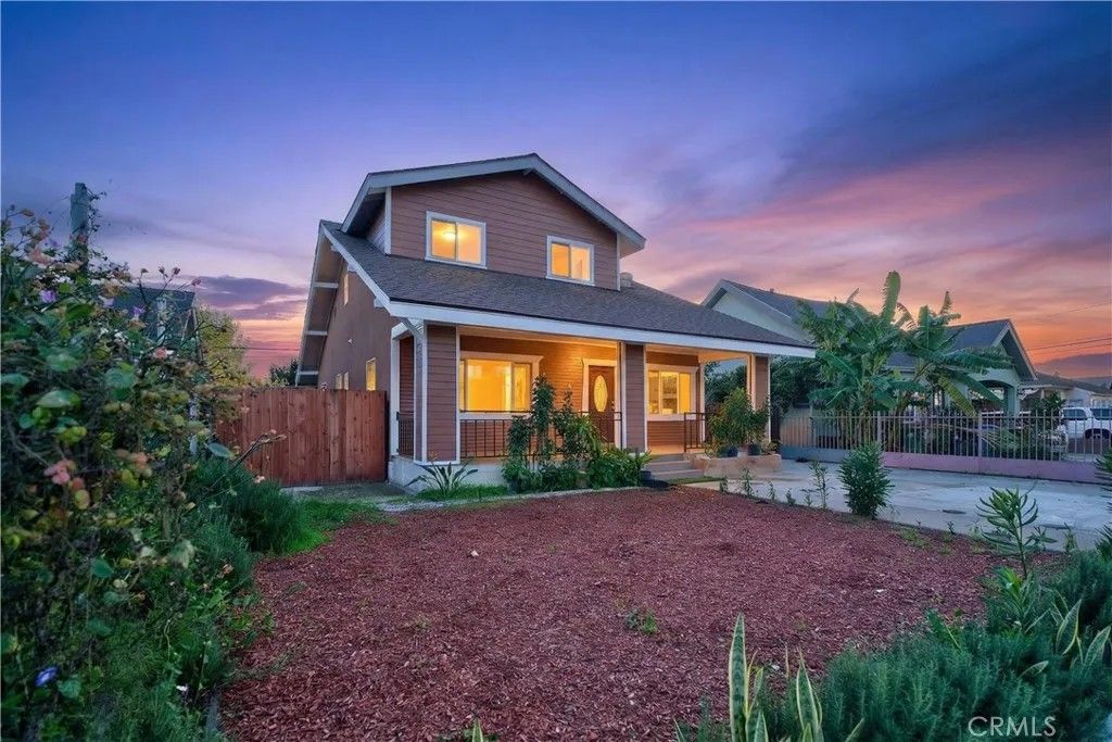 Photo of 1330 W 48th St, Los Angeles, CA 90037 (MLS # DW26005375)