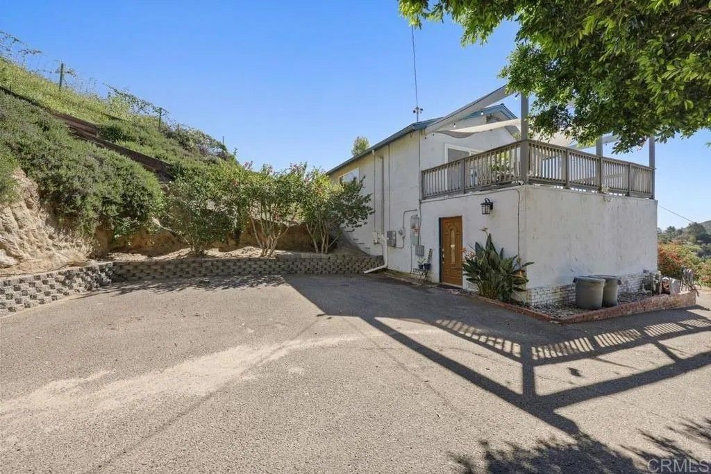 Photo of 12135 Los Amigos Way, Lakeside, CA 92040 (MLS # PTP2601573)