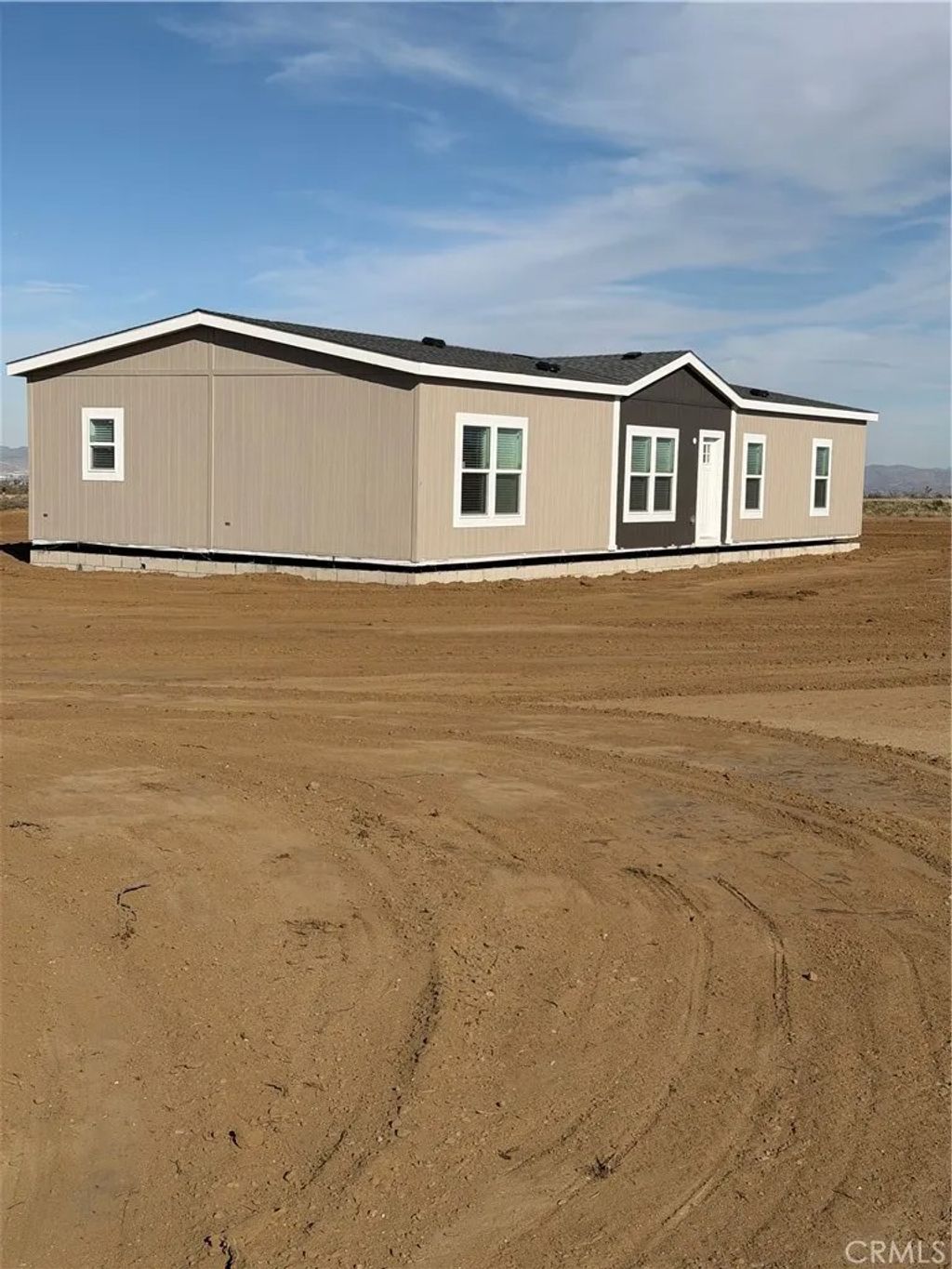 Photo of 12823 Atsina Rd, Phelan, CA 92371 (MLS # SW25281124)