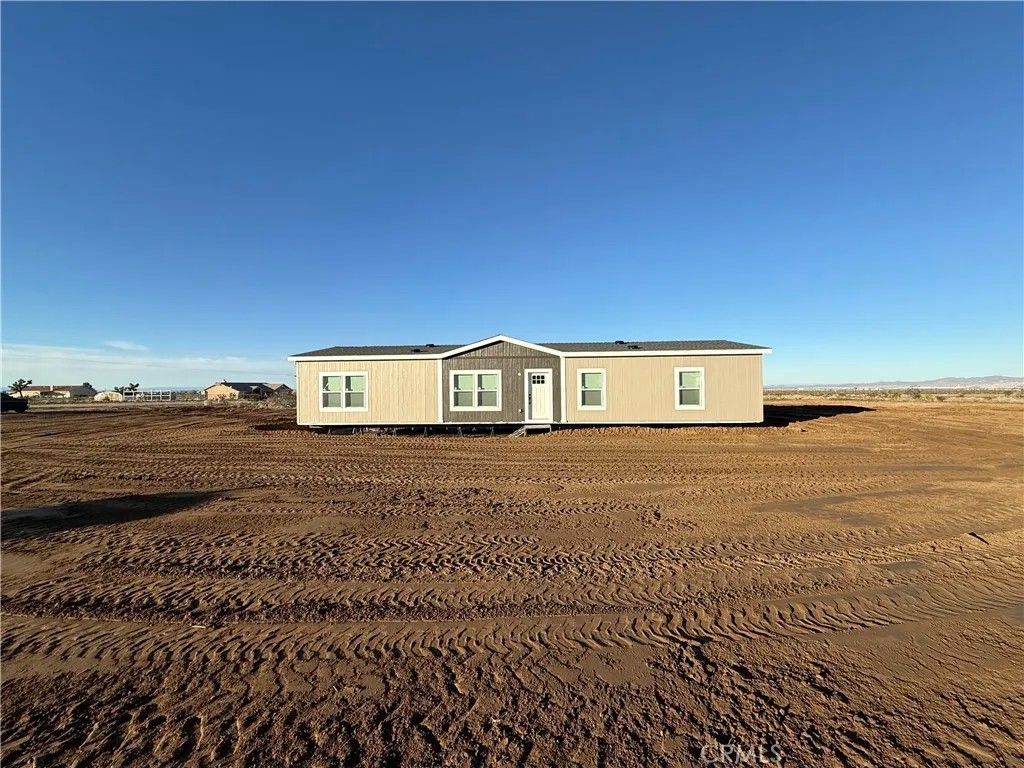 Photo of 12823 Atsina Rd, Phelan, CA 92371 (MLS # SW25281124)