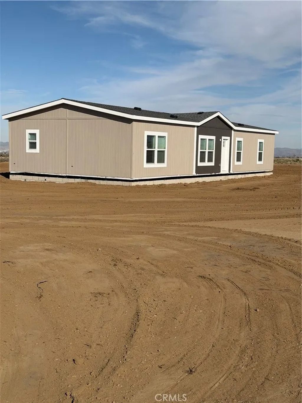 Photo of 12823 Atsina Rd, Phelan, CA 92371 (MLS # SW25281124)