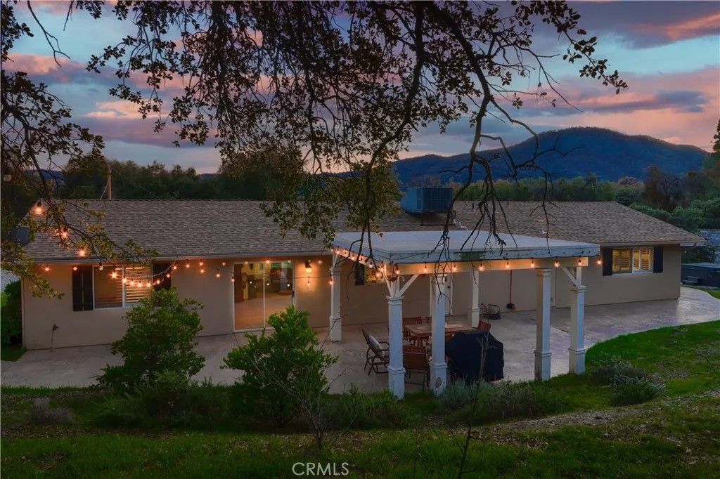 Photo of 40740 Road 425A, Oakhurst, CA 93644 (MLS # FR25273876)