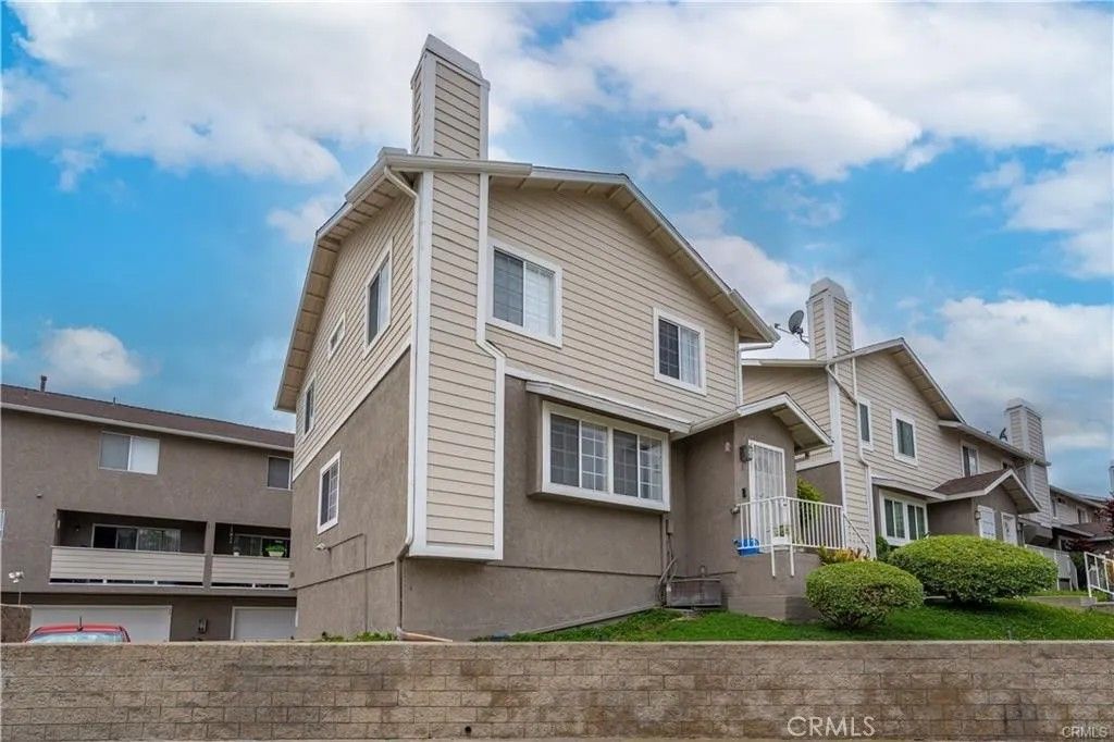 Photo of 15069 Mulberry Dr #21, Whittier, CA 90604 (MLS # PW26000913)