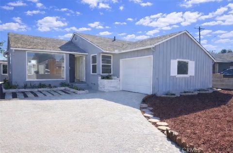 Photo of 9220 Birdvale Dr, Downey, CA 90242 (MLS # IV26017681)