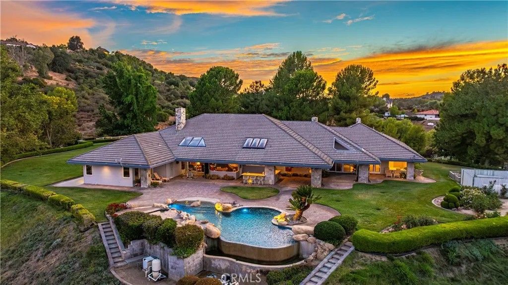 Photo of 21410 Avenida De Arboles, Murrieta, CA 92562 (MLS # IV25223359)