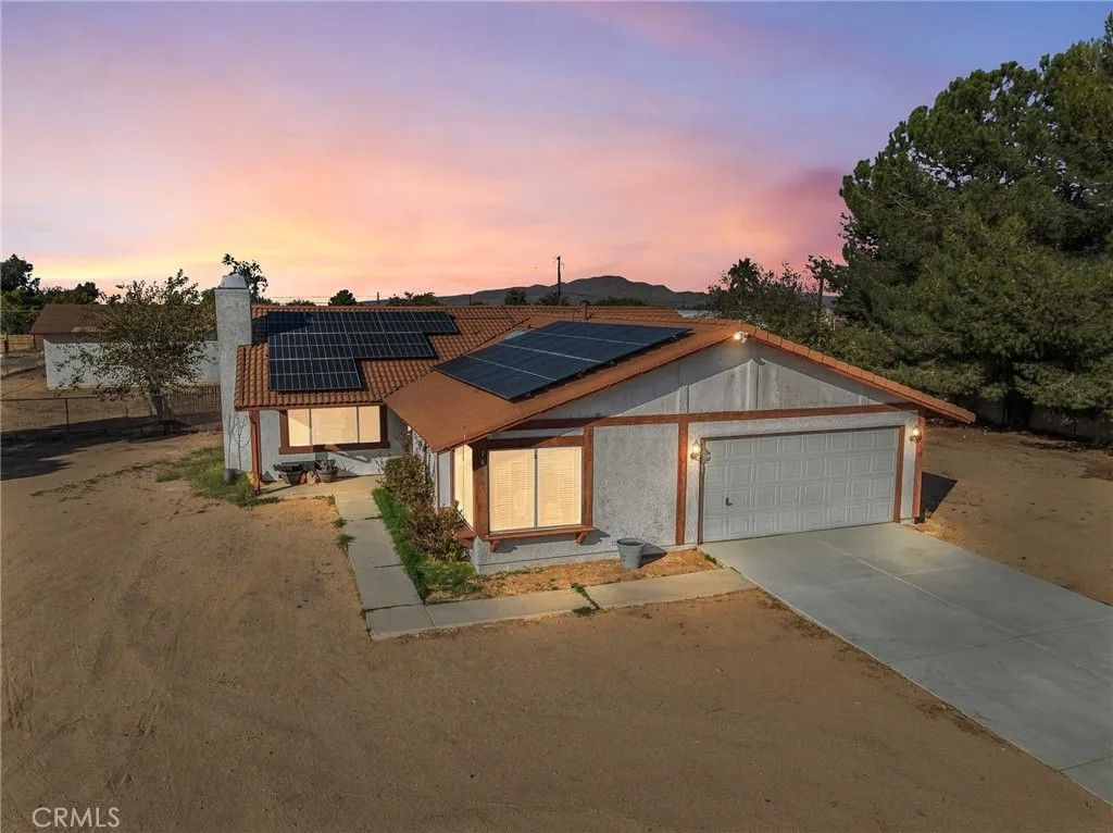 Photo of 14798 Dos Palmas Rd, Victorville, CA 92392 (MLS # HD25251071)