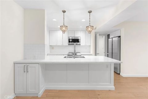 Photo of 5257 Radford Ave #101, Valley Village, CA 91607 (MLS # PV26081776)