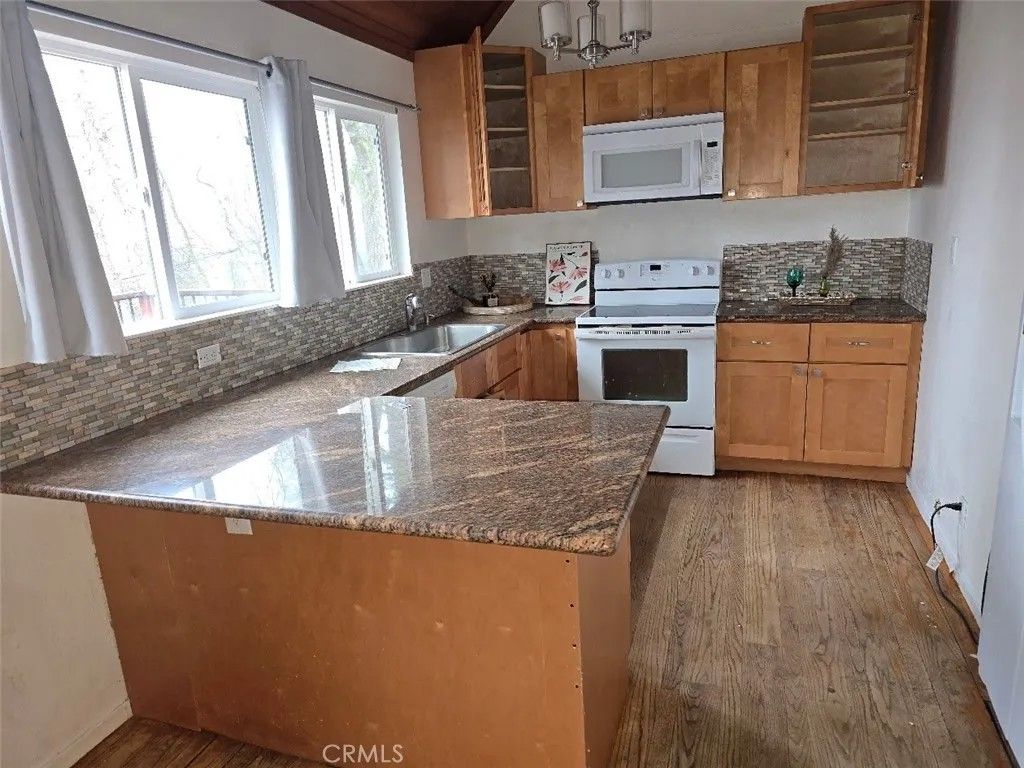 Photo of 12266 Black Oak Dr, Loch Lomond, CA 95461 (MLS # LC26056833)