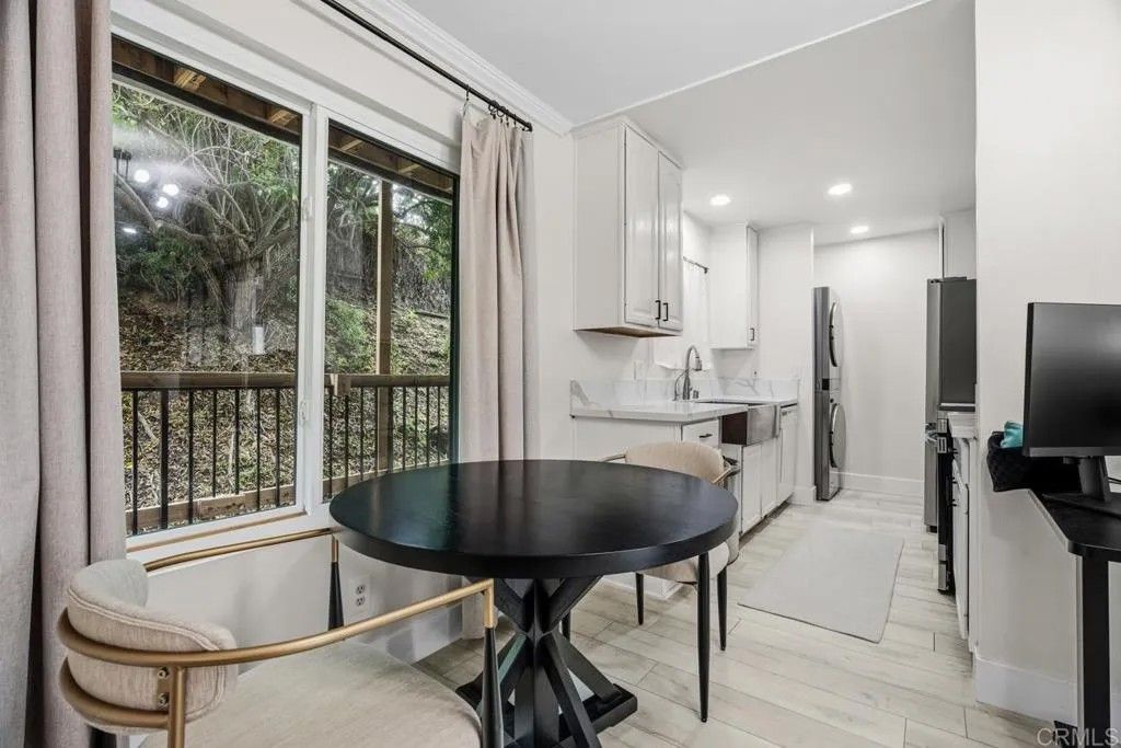 Photo of 6725 Mission Gorge Rd #202B, San Diego, CA 92120 (MLS # PTP2601101)