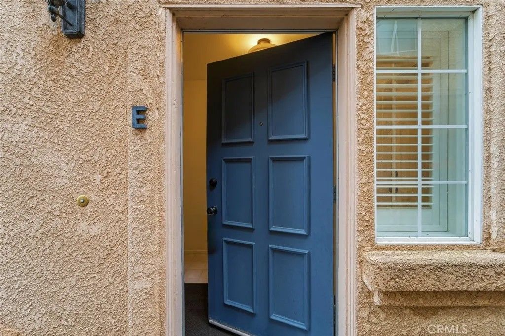 Photo of 25114 Steinbeck Ave #E, Stevenson Ranch, CA 91381 (MLS # SR25265172)