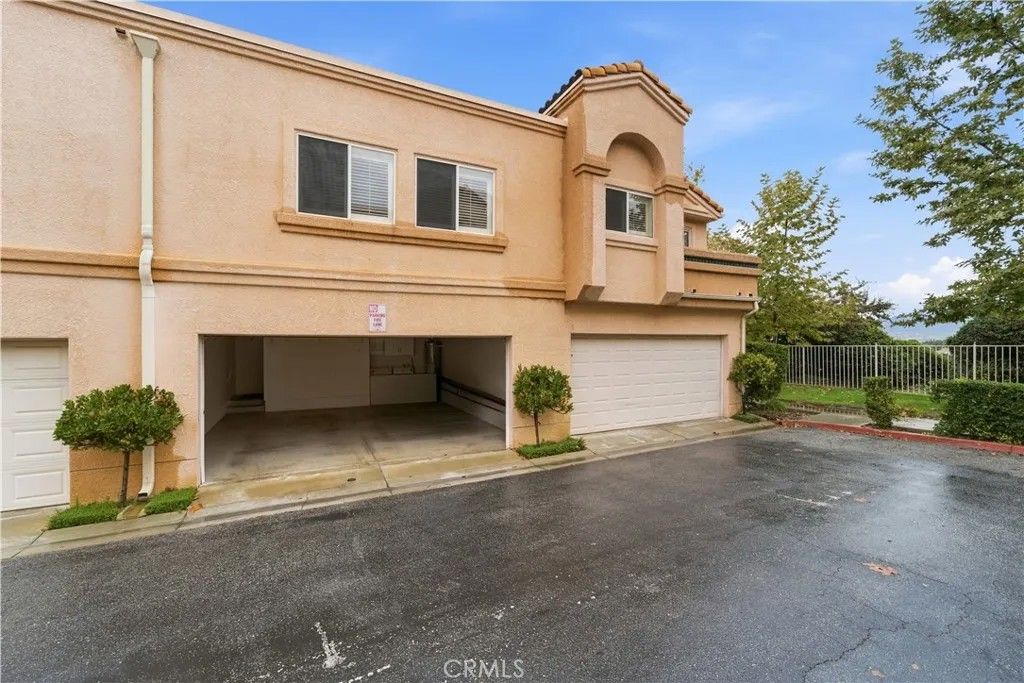 Photo of 25114 Steinbeck Ave #E, Stevenson Ranch, CA 91381 (MLS # SR25265172)