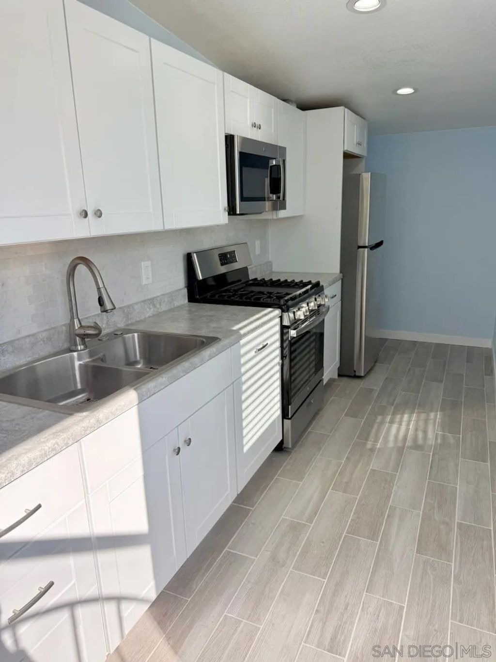 Photo of 3112 W Virgo Rd, San Diego, CA 92105 (MLS # 250045085)